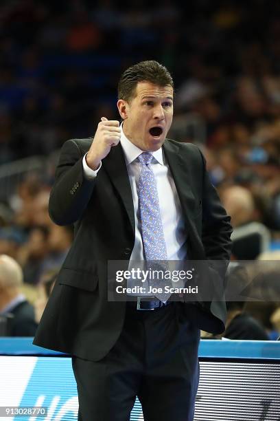 Head coach Steve Alford of the UCLA Bruins yells at his team from the sideline during the game between the UCLA Bruins and the Stanford Cardinal at...