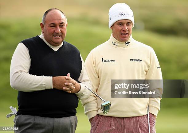 Lee Westwood of England with his playing partner Andrew 'Chubby' Chandler on the 14th hole during the first round of The Alfred Dunhill Links...