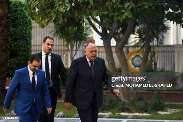 Egyptian Foreign Minister Sameh Shokry arrives to attend the Arab Foreign Ministers meeting at the League's headquarters in the Egyptian capital...