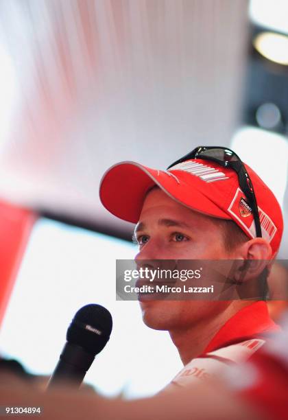 Casey Stoner of Australia and Ducati Marlboro speaks during the Ducati Marlboro Team press conference to announce his return to MotoGP racing during...