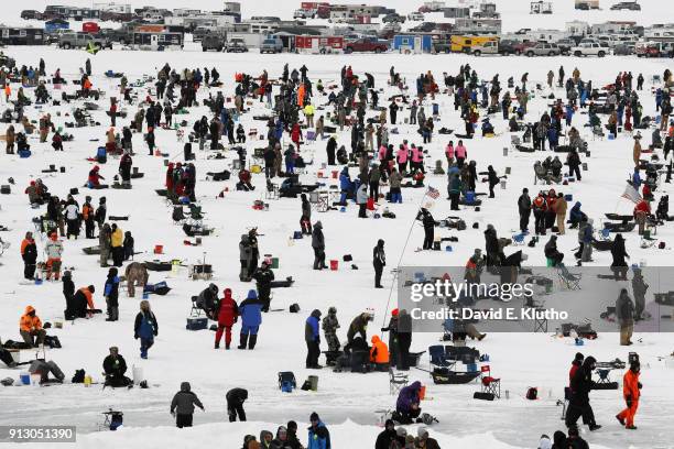 Brainerd Jaycees Ice Fishing Extravaganza: Overall view of contestants gathered on the ice during event on Brainerd Lakes. Contestants came from 38...