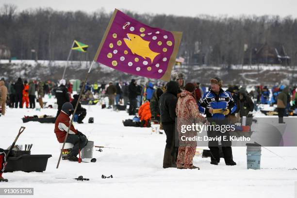 Brainerd Jaycees Ice Fishing Extravaganza: Overall view of contestants gathered on the ice during event on Brainerd Lakes. Contestants came from 38...