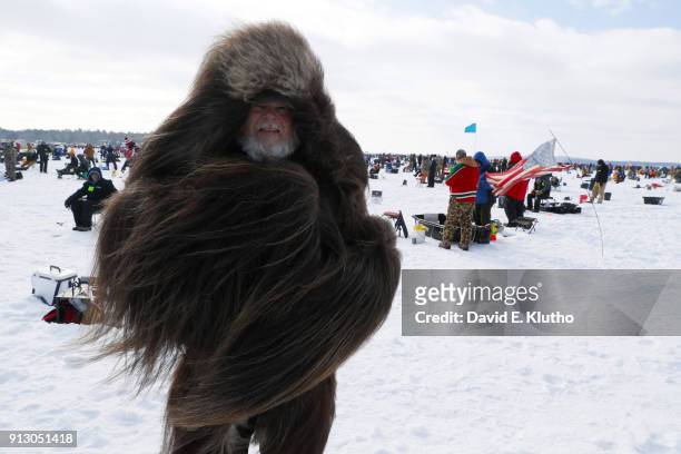 Brainerd Jaycees Ice Fishing Extravaganza: View of contestant in large fur jacket during event on Brainerd Lakes. Contestants came from 38 states and...
