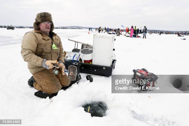 Brainerd Jaycees Ice Fishing Extravaganza: View of contestant fishing during event on Brainerd Lakes. Contestants came from 38 states and at least 6...