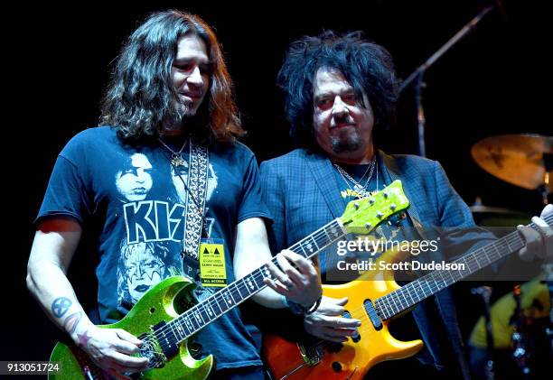 Guitarists Phil X of the band Bon Jovi and Steve Lukather of the band Toto perform onstage with Kings of Chaos at the Adopt the Arts annual rock gala...