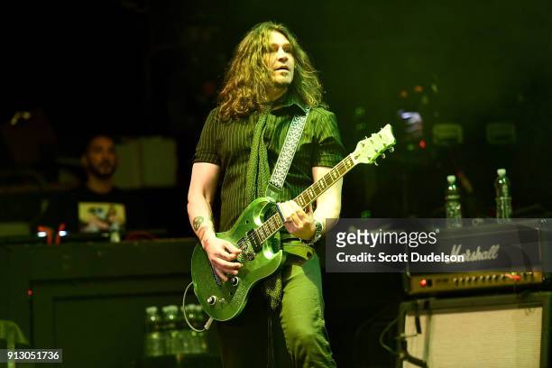 Guitarist Phil X of the band Bon Jovi performs onstage with Kings of Chaos at the Adopt the Arts annual rock gala at Avalon Hollywood on January 31,...