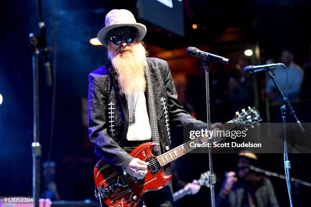 Singer/guitarist Billy Gibbons of the band ZZ Top makes a special appearance with Kings of Chaos during the Adopt The Arts annual rock gala at Avalon...