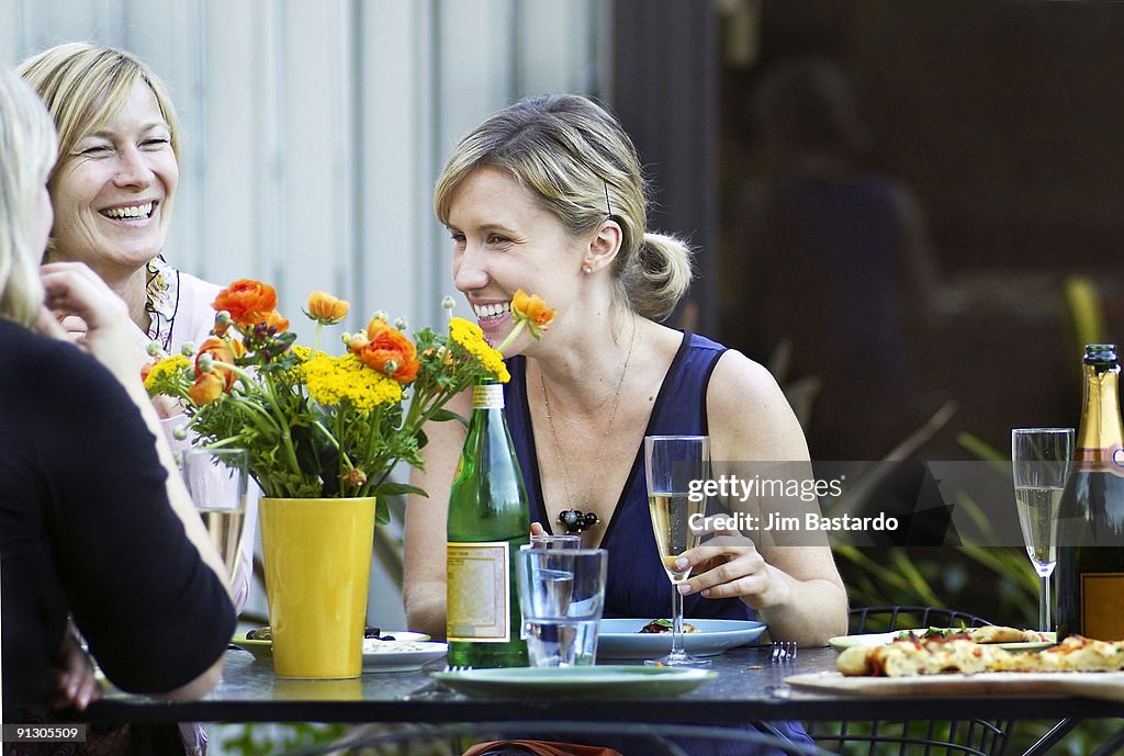 Women laughing and talking