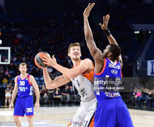 Tibor Pleiss, #21 of Valencia Basket competes with Bryant Dunston, #42 of Anadolu Efes Istanbul during the 2017/2018 Turkish Airlines EuroLeague...