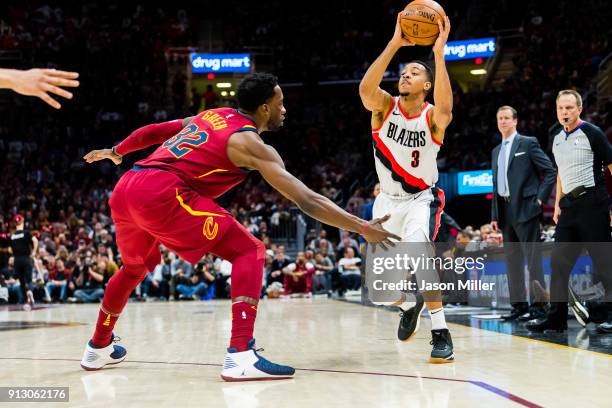 Jeff Green of the Cleveland Cavaliers guards CJ McCollum of the Portland Trail Blazers during the second half at Quicken Loans Arena on January 2,...