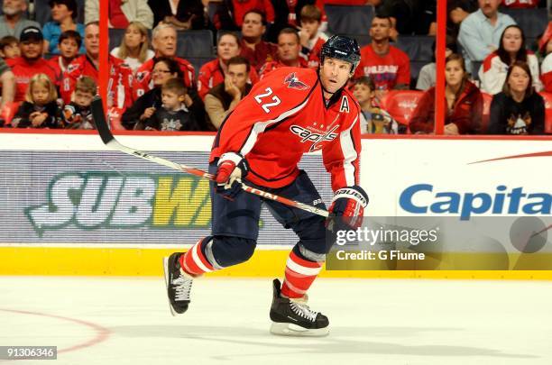 Mike Knuble of the Washington Capitals skates down the ice during the game against the New York Rangers at the Verizon Center on September 27, 2009...