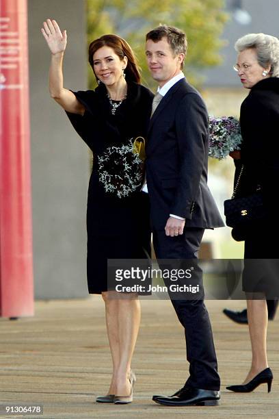 Danish Crown Prince Frederik and Danish Crown Princess Mary arrive to attend the Opening Ceremony of the 121st IOC Session at the Copenhagen Opera...