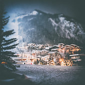 Val d'isere french ski resort illuminated village by snowy night in European Alps in winter