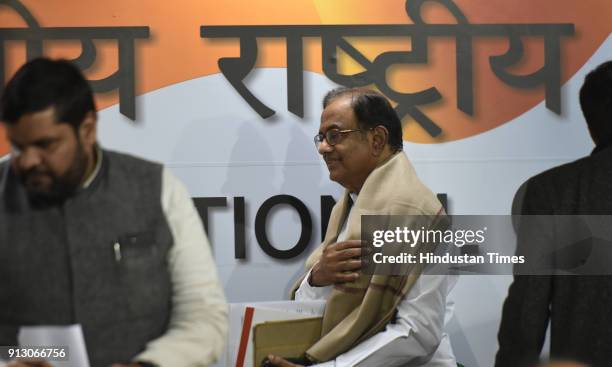 Congress leader and former finance minister P Chidambram leaves after briefing media about the Congress Party's reaction on Union Budget with Randeep...