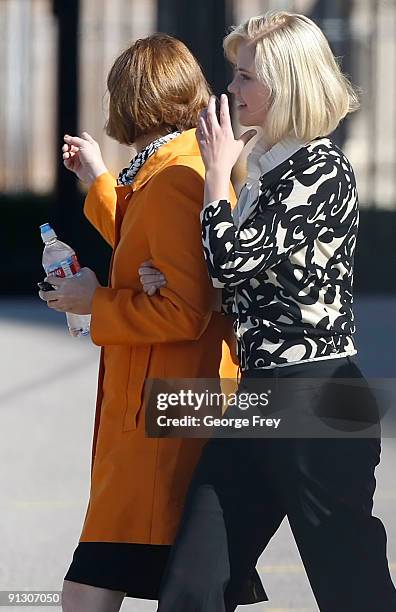 Elizabeth Smart , walks with her mother Louis Smart after Elizabeth Smart testified, for the first time, in a competency hearing for her kidnapper...