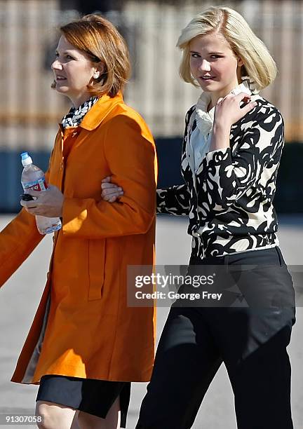 Elizabeth Smart , walks with her mother Louis Smart after Elizabeth Smart testified, for the first time, in a competency hearing for her kidnapper...