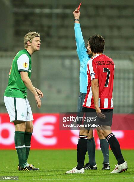 Peter Niemeyer of Bremen gets the yellow-red card from referee Alexandru Dan Tudor during the UEFA Europa League Group L match between SV Werder...