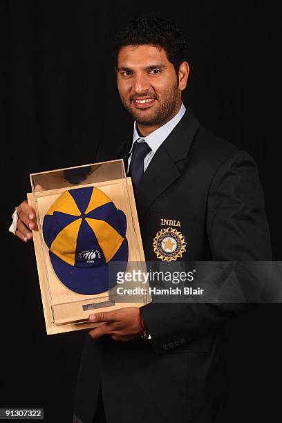 Yuvraj Singh of India poses with his cap as a member of The ODI Team of the Year during the ICC Annual Awards Ceremony held at the Sandton Convention...