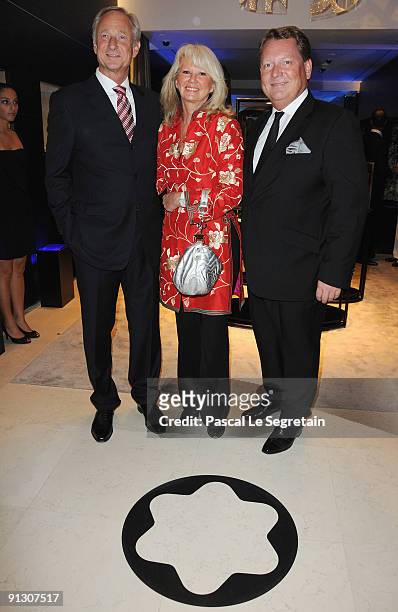 President of Montblanc Lutz Bethge, Ingrid Roosen-Trinks and Managing director of Mont-Blanc France Michel Ade attend the Montblanc Paris Flagship...