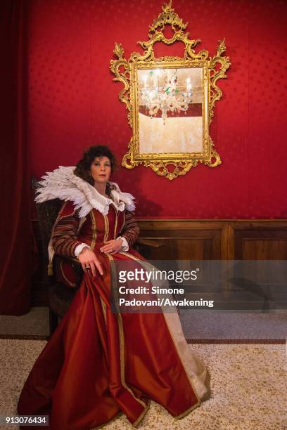 Model poses at the hystorical Ca' Nigra Palace, wearing a costume that is a philological reproduction by Atelier Pietro Longhi of the dress taken...