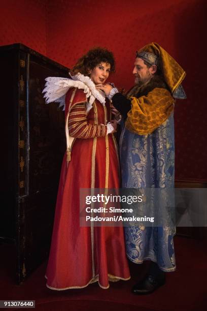 Stefania Stea and Cristiano Vianello pose at the hystorical Ca' Nigra Palace, wearing a costumes of 1400s and a philological reproduction by Atelier...