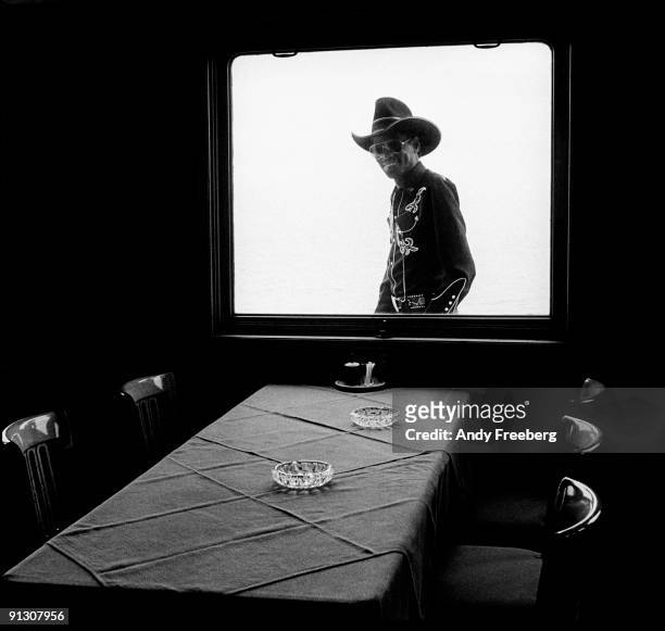 Portrait of blues musician Clarence 'Gatemouth' Brown , seen looking through a window of a boat traveling on Lake Geneva, Switzerland, 1979. He was...