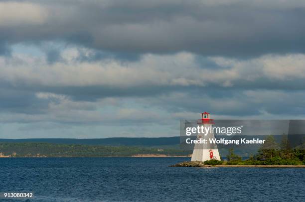 Evening light on Baddeck lighthouse on Bras d'Or Lake, Nova Scotia, Canada.