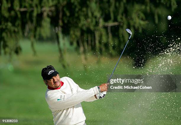 Eduardo Romero of Argentina plays a shot from the bunker during the first round of the Constellation Energy Senior Players Championship at Baltimore...