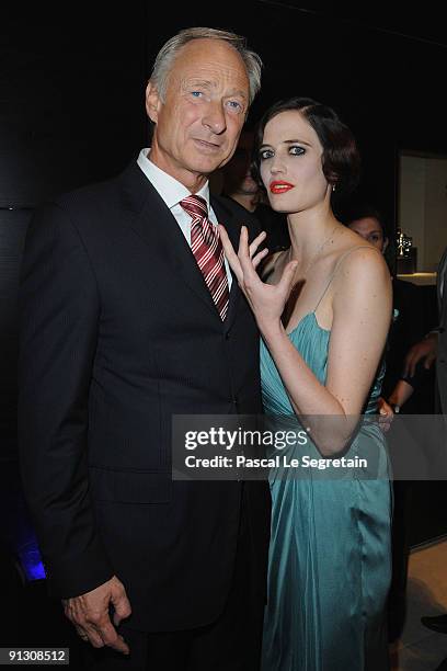 President of Montblanc Lutz Bethge poses with Eva Green as they attend the Montblanc Paris Flagship Boutique Launch - Inauguration Cocktail party on...