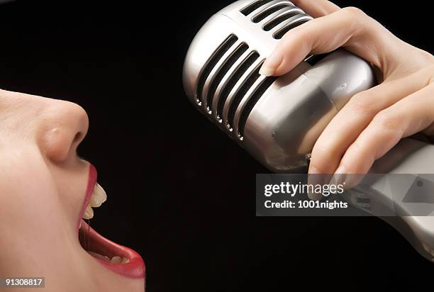 woman singing - microphone mouth stock pictures, royalty-free photos & images