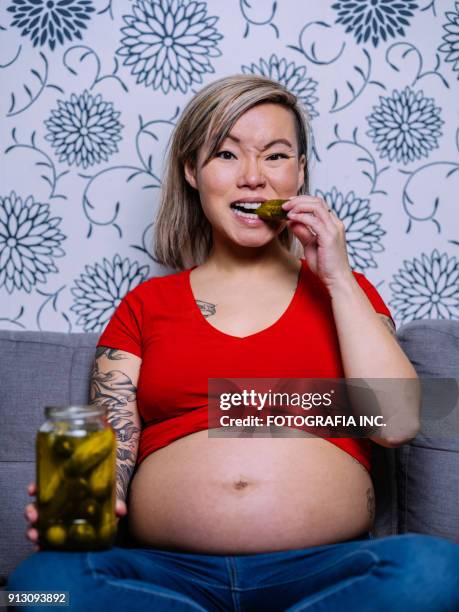 pregnancy cravings - dill pickle stock pictures, royalty-free photos & images