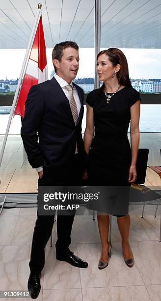 Crown Prince Frederik and Crown Princess Mary of Denmark are pictured before greeting guests at the opening ceremonies of the the 121st International...