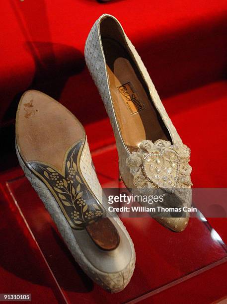 Princess Diana's wedding slippers are displayed at a preview of the traveling "Diana: A Celebration" exhibit at the National Constitution Center on...