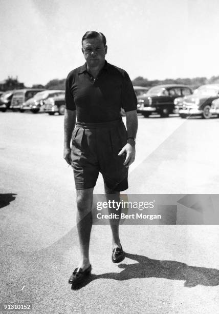 John Sims "Shipwreck" Kelly, former football star and husband of Brenda Frazier, at the Southampton Beach Club, New York, 1953.