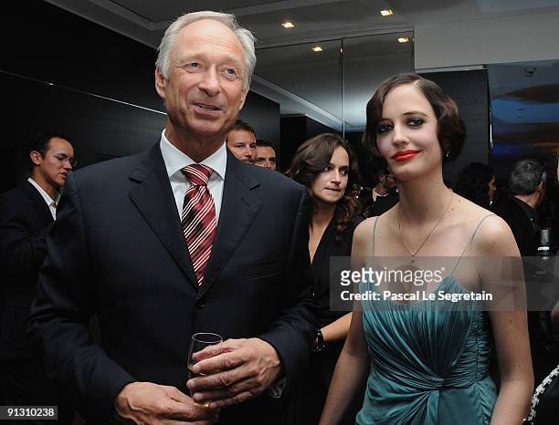 President of Montblanc Lutz Bethge poses with Eva Green as they attend the Montblanc Paris Flagship Boutique Launch - Inauguration Cocktail party on...