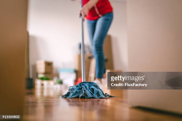 cleaning the floor - housework stock pictures, royalty-free photos & images
