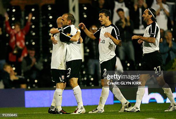 Fulham's English midfielder Danny Murphy celebrates his goal with English striker Andy Johnson during their UEFA Europa League, group E match against...