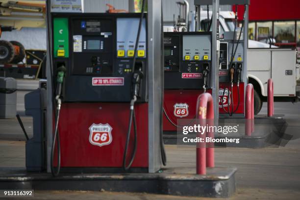 Fuel pumps stand at a Phillips 66 gas station in Shelby, North Carolina, U.S., on Wednesday, Jan. 24, 2018. Phillips 66 is scheduled to release...