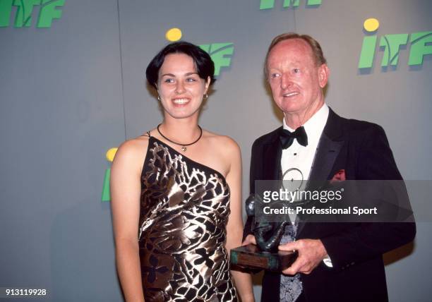 Martina Hingis of Switzerland and tennis legend Rod Laver of Australia during the ITF World Champions Dinner at the Pavillion d'Armenonville after...