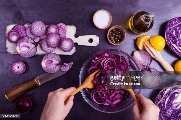 ultra violet. preparation of vegetables salad - cebolla fotografías e imágenes de stock