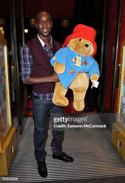 Footballer Carlton Cole attends the launch of iPod skins by Wrappz in aid of Children In Need at Hamleys on October 1, 2009 in London, England.