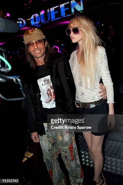 Omar Harfouch and Yulia Lobova attend the Christophe Guillarme Spring Summer 2010 Pret-a-Porter during the Paris Womenswear Fashion Week...