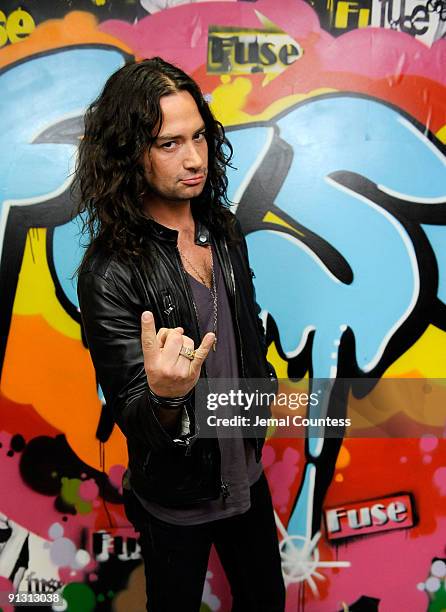 Singer/actor Constantine Maroulis poses at the fuse wall after a taping of "The Pop Show" at fuse Studios on October 1, 2009 in New York, New York.