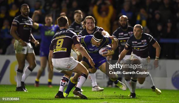 Bryson Goodwin of Warrington scores his team's opening try during the Betfred Super League match between Warrington Wolves and Leeds Rhinos on...