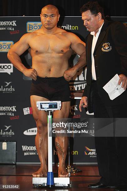 Lance Revill weights David Tua in at 107.8 during the official weigh-in for 'The Fight of the Century' between David Tua and Shane Cameron tomorrow...