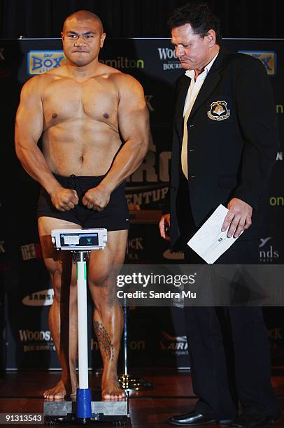 Lance Revill weights David Tua in at 107.8 during the official weigh-in for 'The Fight of the Century' between David Tua and Shane Cameron tomorrow...