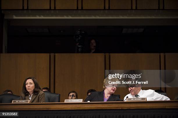 Sen. Maria Cantwell, D-Wash., Sen. Debbie Stabenow, D-Mich., and Sen. Charles E. Schumer, D-N.Y., during the Senate Finance markup of a health care...