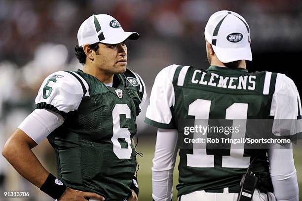 Mark Sanchez and Kellen Clemens of the New York Jets on the sidelines during the game against the Philadelphia Eagles on September 3, 2009 at Giants...