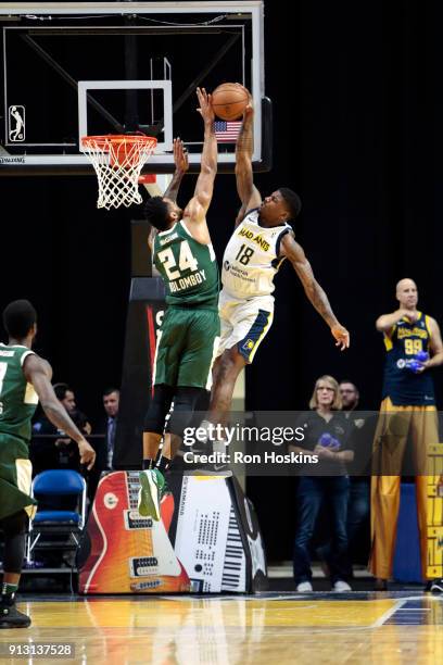 DeQuan Jones of the Fort Wayne Mad Ants drives to the basket against Joel Bolomboy of the Wisconsin Herd on February 1, 2018 at Memorial Coliseum in...