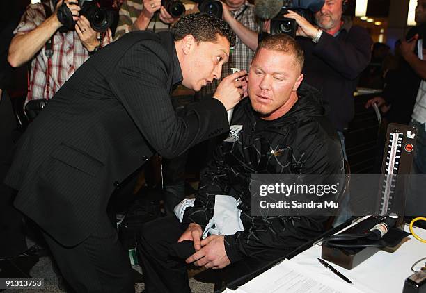 Shane Cameron has a medical check during the official weigh-in for 'The Fight of the Century' between David Tua and Shane Cameron tomorrow night at...